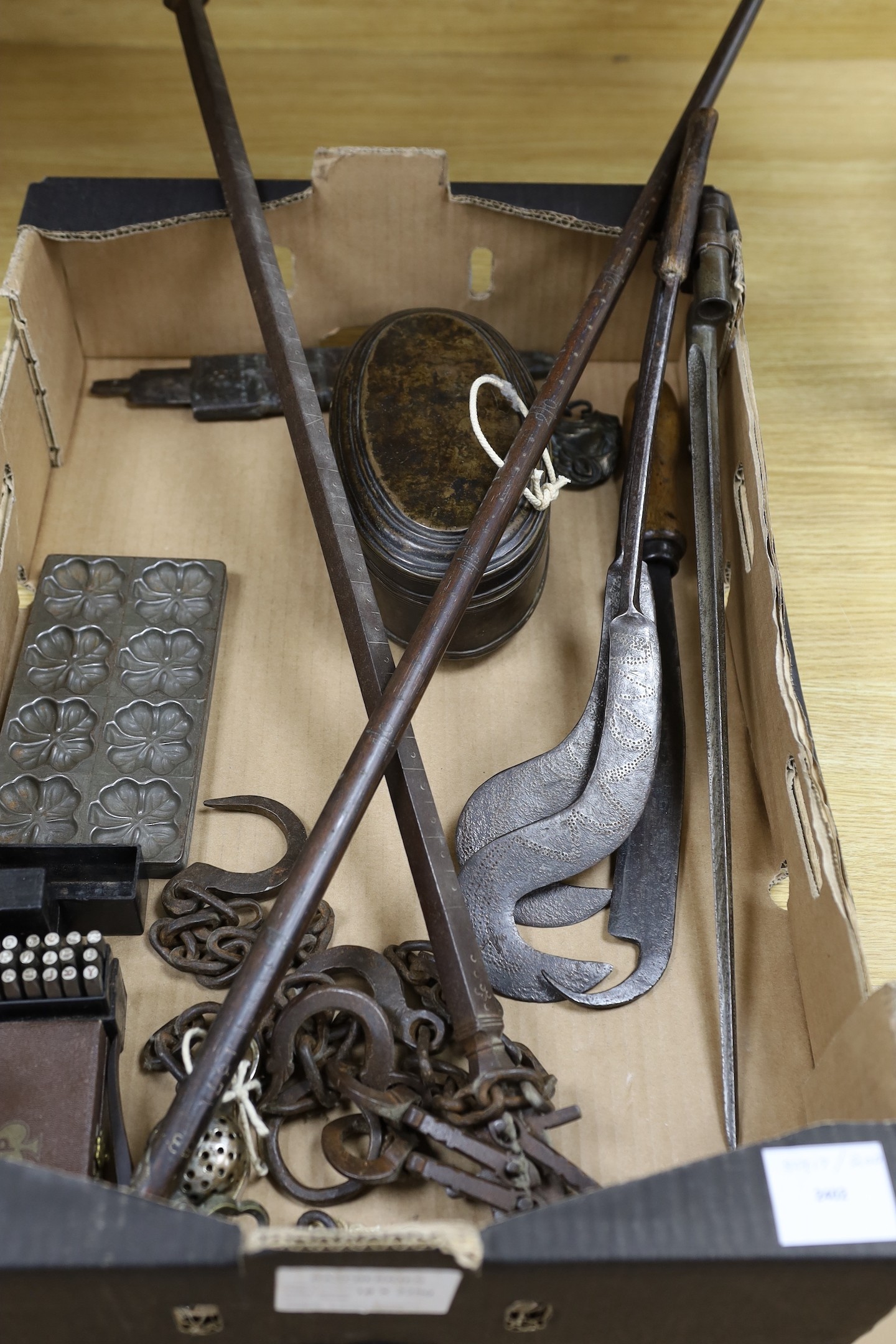 A 19th century steelyard, bayonet, two long-handled pokerwork blades, oval brass box, etc.